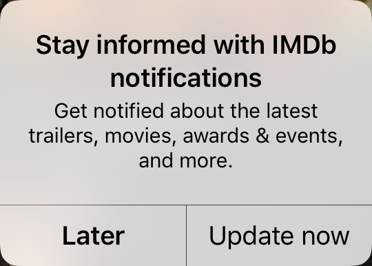 An iOS notification that reads "Stay informed with IMDb notifications. Get notified about the latest trailers, movies, awards & events, and more. There are two buttons labeled "Later" and "Update now"