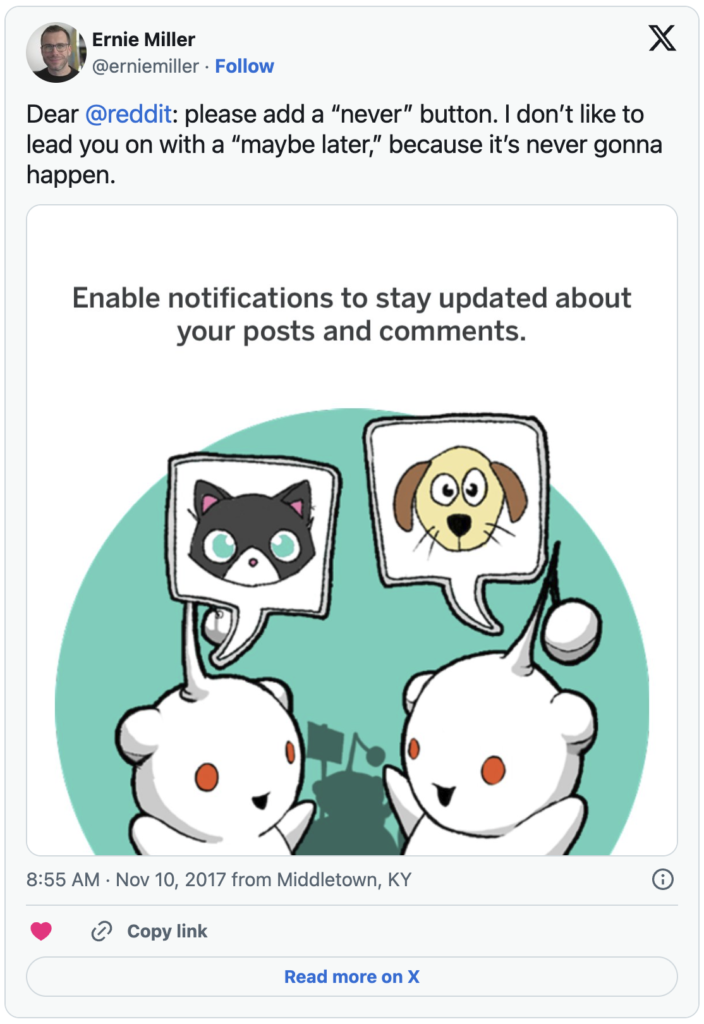 A Tweet from @erniemiller at 8:55 AM on November 10, 2017 that reads "Dear @reddit: please add a 'never' button. I don't like to lead you on with a 'maybe later,' because it's never gonna happen." The Tweet includes a screenshot of a notification from the Reddit app that reads "Enable nofitications to stay updated about your posts and comments."